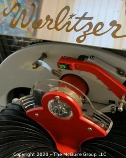 Wurlitzer Jukebox, 1954 Model F-1700, restored with manual and 45 rpm records.  In addition, (2) Matching Art Deco Vintage Wurlitzer Model 5205 Remote Wall Box Table Top Jukeboxes; 12 x 12 7.5"D32"W x 28"D x 56"T