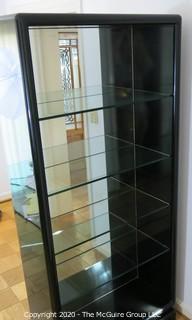 Art Deco Style Black Lacquered Etagere with 4 glass shelves and mirrored back. Made in Italy. 36W x 15D x 80"T 