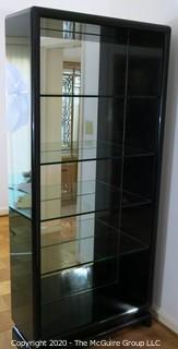 Art Deco Style Black Lacquered Etagere with 4 glass shelves and mirrored back. Made in Italy. 36W x 15D x 80"T 