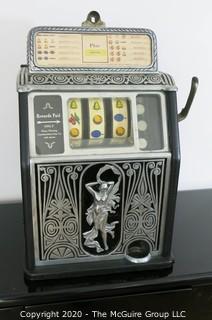 "The Naked Lady" Art Deco Caille Bros. Superior 25 Cent Bell Fruit Gum Slot Machine, circa 1925 in Working Condition. 13 5/8" x 12 3/8" x 22"T. 