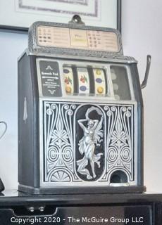 "The Naked Lady" Art Deco Caille Bros. Superior 25 Cent Bell Fruit Gum Slot Machine, circa 1925 in Working Condition. 13 5/8" x 12 3/8" x 22"T. 