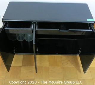 Art Deco Style Black Lacquered Buffet; (2) Single door on left, double doors on right, both featuring pullout top drawer with two shelves beneath. Made in Italy. 48W x 13D x 32"T 