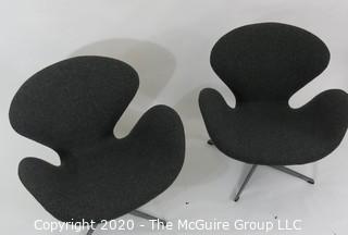 Pair of 1960 Mid Century Modern Arne Jacobson Fritz Hansen Swan Chairs in Charcoal fabric on Chrome Pedestal Base. Label number #0968 with Made in Denmark Stamp on underside. MCM
