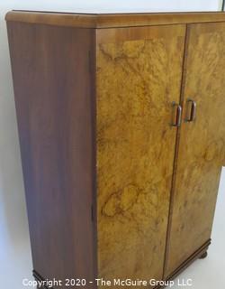 Tall men's dressing cabinet; Art Deco Period Piece with highly figured book-matched veneer front; 33"W  51"T x 19"D.  Vintage. Furniture.