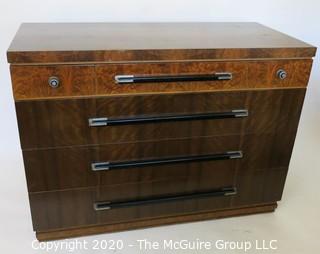 Art Deco Dresser Made of Highly Figured Book-Matched Veneers (matching pieces to the set are found in Lots 82 and 83). 48" wide 22" deep,  35"tall