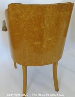 Two Vintage English Club Chairs with Leather Upholstery and Birds-Eye Maple Veneer, circa 1936.  Small amount of delamination on top ridge of one chair as shown. Outside arm to arm width 25.5"; inside seat to seat width 17", seat depth 18.5", seat height 19.5", height at back 35.5")