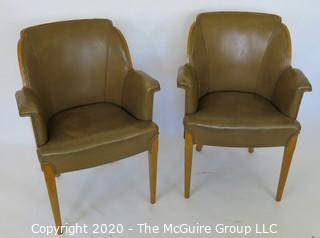 Two Vintage English Club Chairs with Leather Upholstery and Birds-Eye Maple Veneer, circa 1936.  Small amount of delamination on top ridge of one chair as shown. Outside arm to arm width 25.5"; inside seat to seat width 17", seat depth 18.5", seat height 19.5", height at back 35.5")