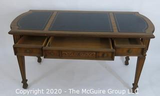 Embossed Leather Topped Fruitwood Writing Desk with three drawers and gilt Decoration, Made in France; 60W x 27D x 30"T