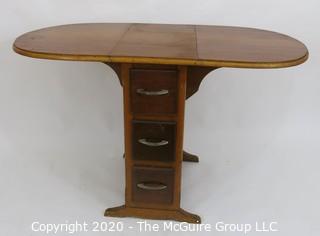 Drop Leaf Work Table or Desk with Three Drawers; center panel 12"W x 24D x 29.25"T; each wing adds 17.5" to top when extended  