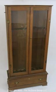 Wooden Gun Case with Bottom Drawer and Glass Paneled Doors. 31W x 11.5D x 64.5"T 