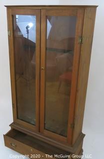 Wooden Gun Case with Bottom Drawer and Glass Paneled Doors. 31W x 11.5D x 64.5"T 