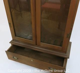 Wooden Gun Case with Bottom Drawer and Glass Paneled Doors. 31W x 11.5D x 64.5"T 