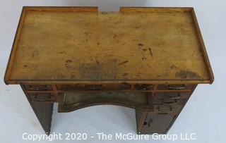 Industrial Wood Jeweler's Desk or Watchmakers Work Bench with Railings, Drawers in Range of Sizes to Keep Tools Organized and Catch Tray for catching bench sweeps.  Some Damage to Base. 40"W x 20"D x 36"T