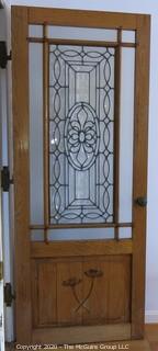 Solid Oak Interior Door with Center Leaded Faceted Glass Panel.  Features two different marquetry inlaid accents on bottom panel and Art Deco Period Hardware, including 3 "Bullet" Hinges.  Architectural Salvage. 31.5W x 75T x 1.75" 