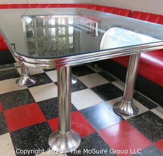 Furniture: 1950's style "Diner" booth with two-piece corner banquette, 2 red stools, 2 black stools and glass topped chrome table on 4 pedestal feet.  Table is 48" x 68" x 31"T; Banquette is 73" end to wall x 90" end to wall. Banquette is 30.5" tall at back x 17.5" seat height.  Stools are 21"T. Note: photo shows 1.5" worn banquette seat.   