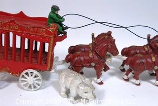 Cast Iron 8 Horse Drawn Overland Circus Carriage with Polar Bear Cage.  Wheels out of balance.  