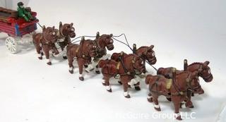 Cast Iron 8 Clydesdale Horse Drawn Beer Carriage with Barrels.  Measures approximately 30" long. 