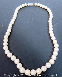 Vintage Pearl Necklace with Sterling Clasp.  Clasp broken. Measures approximately 16",