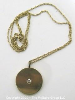 14 kt Yellow Gold Disk Pendant on Chain with Diamond