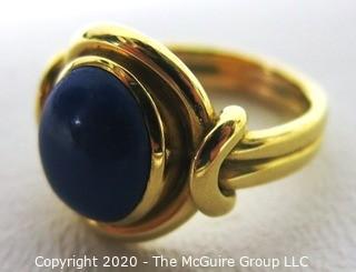 Yellow Gold Plated Ring with Lapis Stone Center. 