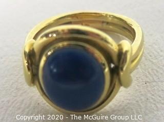 Yellow Gold Plated Ring with Lapis Stone Center. 