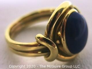 Yellow Gold Plated Ring with Lapis Stone Center. 