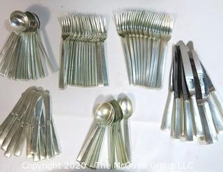 Vintage Art Deco 71 Piece Sterling Silver Flatware Set Made by International Sterling in Art Deco Silver Box. This set has 12 Place Settings (6 Pieces Each with the exception on one setting which is missing a dinner knife).  Weighs 2860 grams excluding knives.