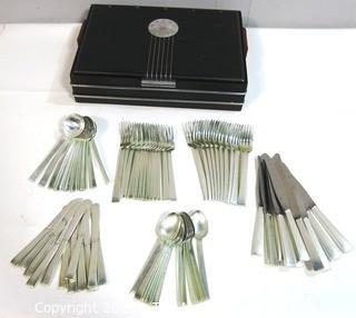 Vintage Art Deco 71 Piece Sterling Silver Flatware Set Made by International Sterling in Art Deco Silver Box. This set has 12 Place Settings (6 Pieces Each with the exception on one setting which is missing a dinner knife).  Weighs 2860 grams excluding knives.