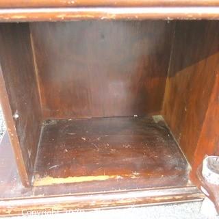 Vintage Art Deco Coffee Table with Bar Cabinet Base and Blue Glass Mirror Top.  Measures approximately 33" long and 18 Wide.  Some separation of top from base, but should be easy to repair