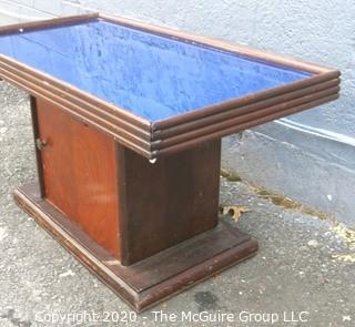 Vintage Art Deco Coffee Table with Bar Cabinet Base and Blue Glass Mirror Top.  Measures approximately 33" long and 18 Wide.  Some separation of top from base, but should be easy to repair