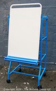 Shared Reading Center Metal Easel on Rolling Stand Made by Copernicus Educational Products.  To be used with Dry Erase Markers with detachable marker tray.  Measures approximately 64" tall.