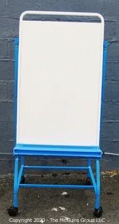 Shared Reading Center Metal Easel on Rolling Stand Made by Copernicus Educational Products.  To be used with Dry Erase Markers with detachable marker tray.  Measures approximately 64" tall.