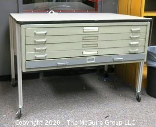 Industrial Steel Flat File Table with Five Drawers on Legs with Casters.  Measures approximately 57" x 38" x 39".