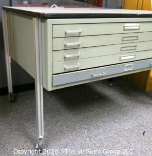 Industrial Steel Flat File Table with Five Drawers on Legs with Casters.  Measures approximately 57" x 38" x 39".