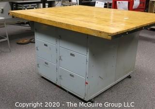 Vintage Industrial Wood Top Work Table with Storage Underneath on Casters.   Measures 54 x 64 x 36"t