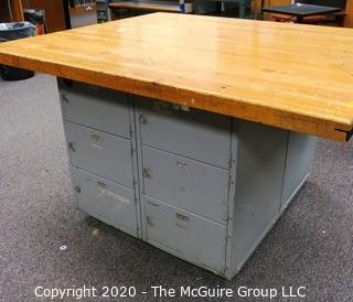 Vintage Industrial Wood Top Work Table with Storage Underneath on Casters.   Measures 54 x 64 x 36"t