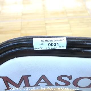 Padded Metal Folding Chair with George Mason Logo.  Used as Home Basketball Team Seating in the Pit