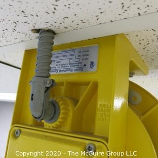 Daniel Woodhead 600V Model 9383 Industrial Grade Ceiling Mounted Retractable Electrical Cord Reel;  12/3 SOW-A 90C (Unit has been disconnected from power source, but still requires disassembly from ceiling by buyer)