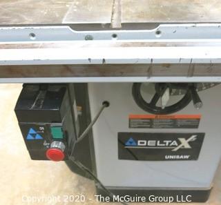 Delta X5 UNISAW Table Saw with metal base side feed table; 220V; As Is.  