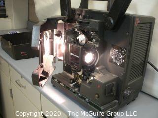 Vintage Bell & Howell Model 2592 16mm film projector w film