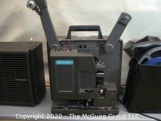 Bell & Howell Model 1268, 16mm film projector, w/carrying cover and reels. As is.