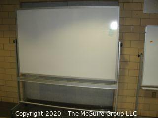 Double sided white board on casters, 48" x 72" and 78" tall (a few dings)