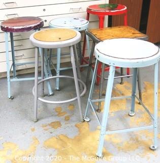 (6) Industrial Stools in Varying Heights and Styles.  Some painted by students.  The red stool with green illustration is missing from this lot.  Lot is now only for 5 stools.   Description altered on 12/28 at 5:06 PM EST. 