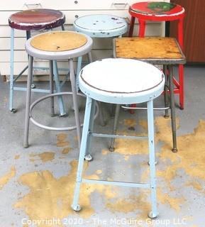 (6) Industrial Stools in Varying Heights and Styles.  Some painted by students.  The red stool with green illustration is missing from this lot.  Lot is now only for 5 stools.   Description altered on 12/28 at 5:06 PM EST. 