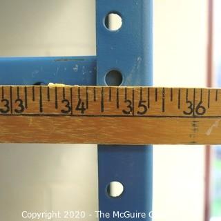 (6) Linear Feet of Blue Steel Wall Mounted Industrial Shelving.   