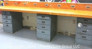 27" x 130" x 34"t Industrial Wood Block Table with Metal File Drawer Base.  Does not include socket back board.