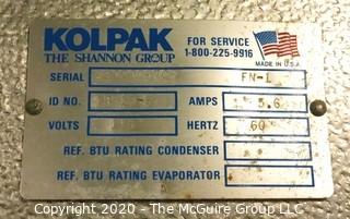 Kolpack Walk In Cooler S/N 32790970R.  Condenser is on the outside of building.  Interior measures approximately 14' x 9'.  Description altered 12/28 at 5:03 EST.