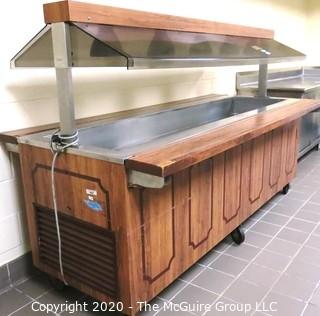 Buffet serving station on casters with overhead lights