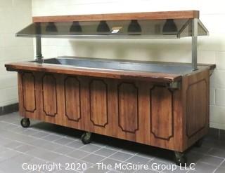 Buffet serving station on casters with overhead lights