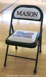 Padded Metal Folding Chair with George Mason Logo.  Used as Home Basketball Team Seating in the Pit